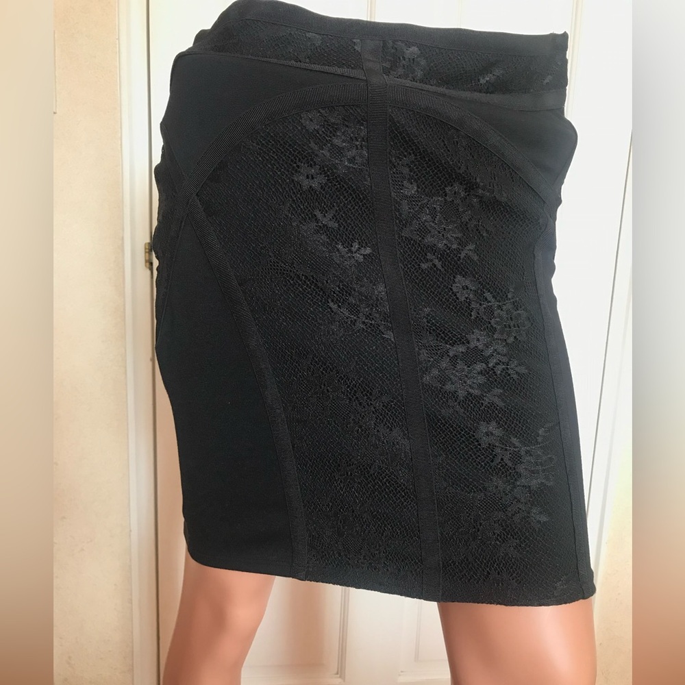 Free People new black lace mini skirt in size XS.